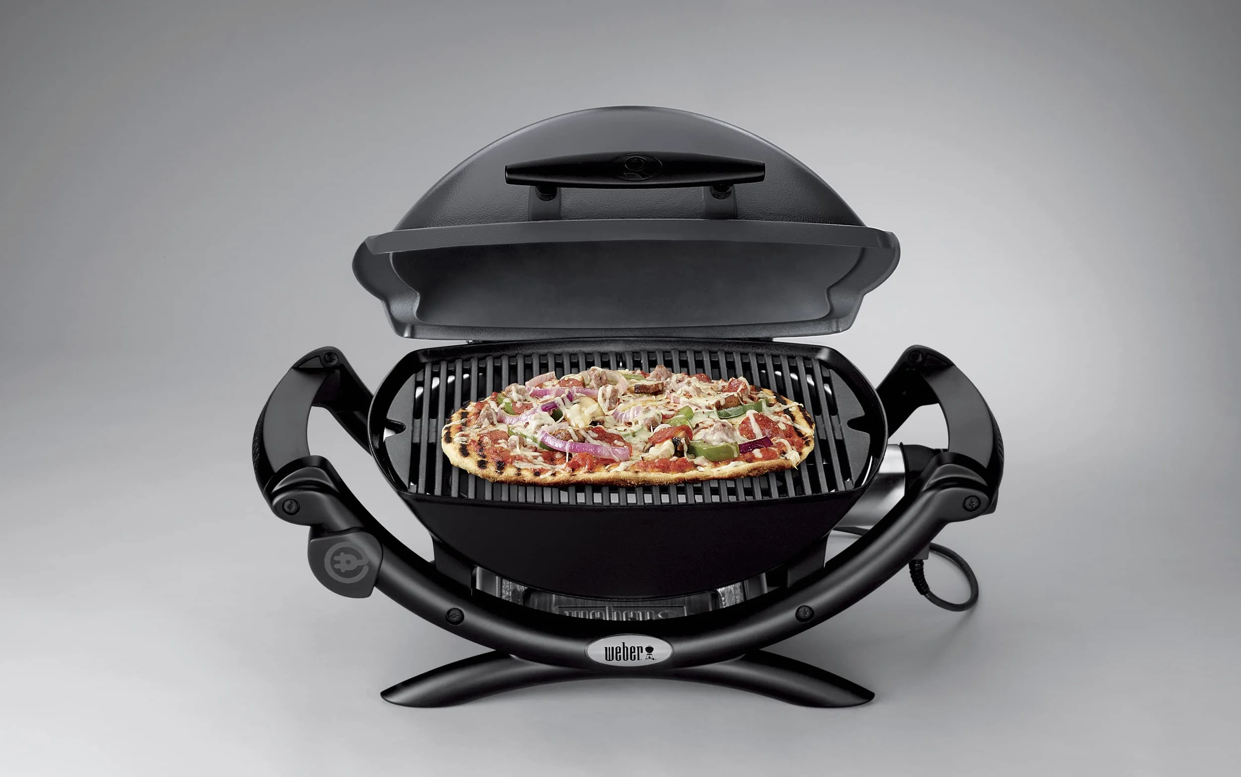 Weber Q1400 Elektryczny Grill, powierzchnia grillowania 43 x 32 cm, przenośny BBQ Grill,2-częściowy żeliwny ruszt pokryty emalią porcelanową, pokrywa i obudowa aluminiowa - Ciemnoszary (52020079)