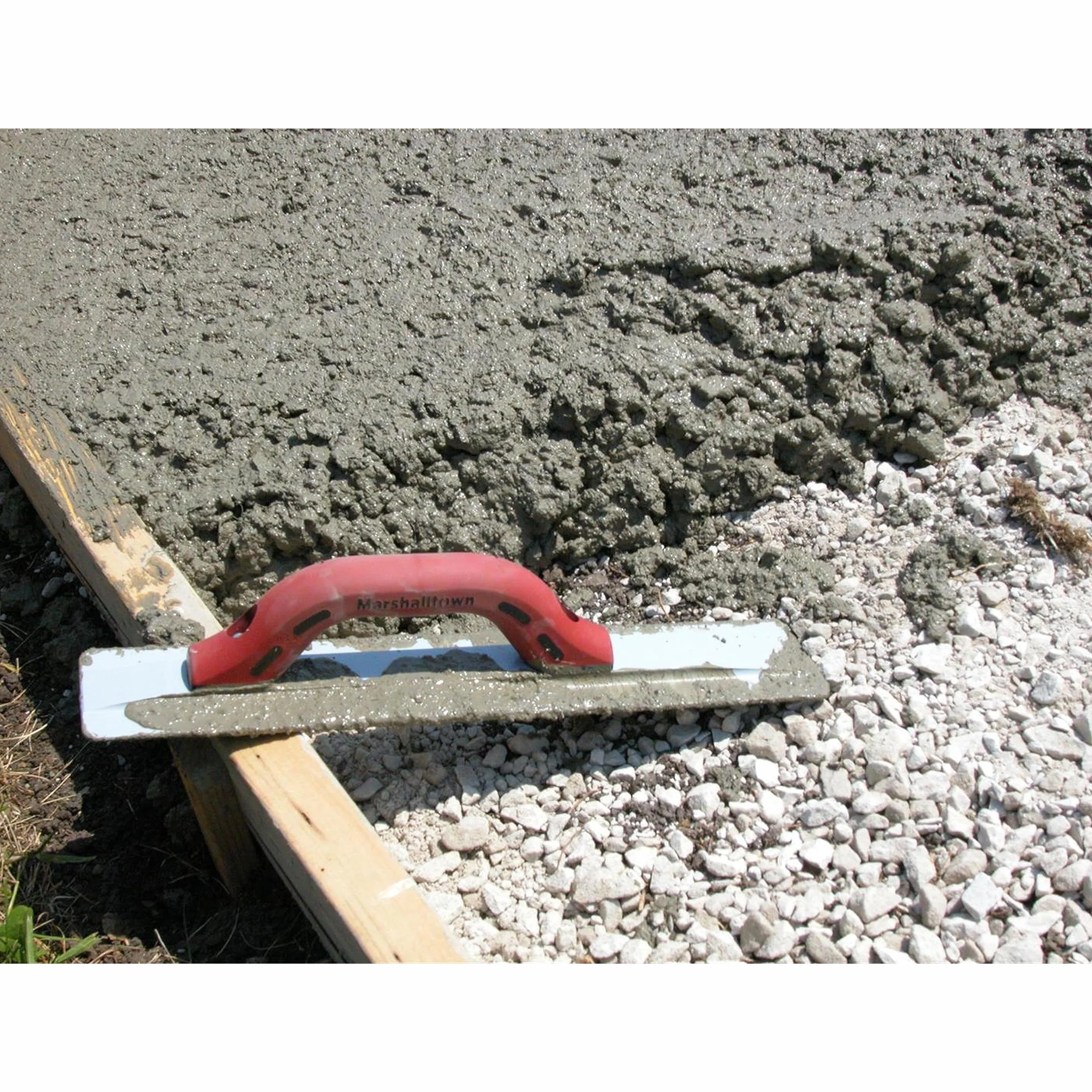 Paca ręczna Marshalltown z uchwytem Durasoft, wykonana z magnezu, do posadzek i betonu, rozmiar pacy: 305x79 mm