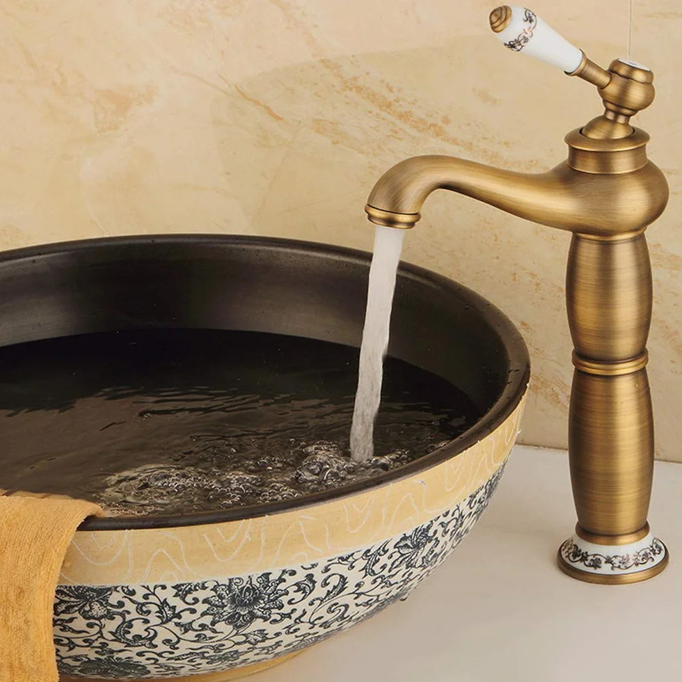 Vintage w pełni miedziany kran łazienkowy z ceramicznym uchwytem retro umywalka artystyczna bateria do podwyższonej sceny umywalka mieszacz ciepłej wody z napowietrzaczem klasyczny design dla